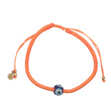 Bracelet doré cordon orange fluo oeil bleu