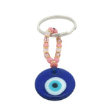 Porte-clefs oeil rond en pâte de verre soufflé bleu mix perles roses