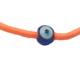 Bracelet doré cordon orange fluo oeil bleu
