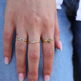 Stone trilogy ring and triple ring