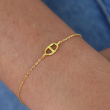 Small anchor link gold bracelet
