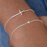 Silver cross and white zircons bracelet