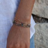 Bracelet of natural stones and golden pearls