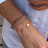 Duo bracelet of stones and golden discs