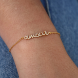 Bracelet doré message "amour" avec zircons blancs