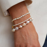 Golden bracelet with irregular cultured pearls