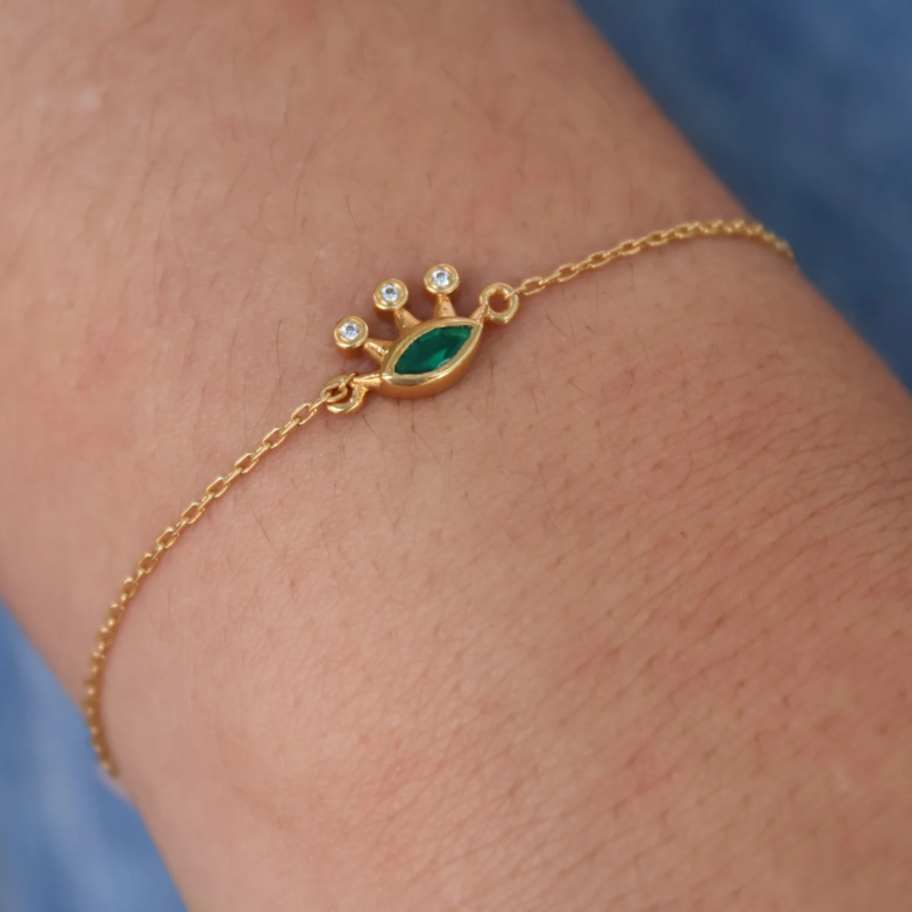 Gold crown bracelet with stone and zircons