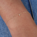 Gold and diamond dove bracelet