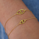 Small anchor link gold bracelet