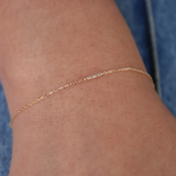 Gold bracelet and diamond bar