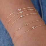 Gold crescent moon diamond bracelet