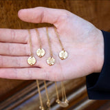 Gold necklace with zodiac sign medal