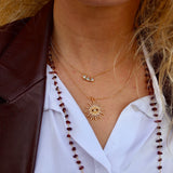 Gold necklace with 3 drop stones and zircons