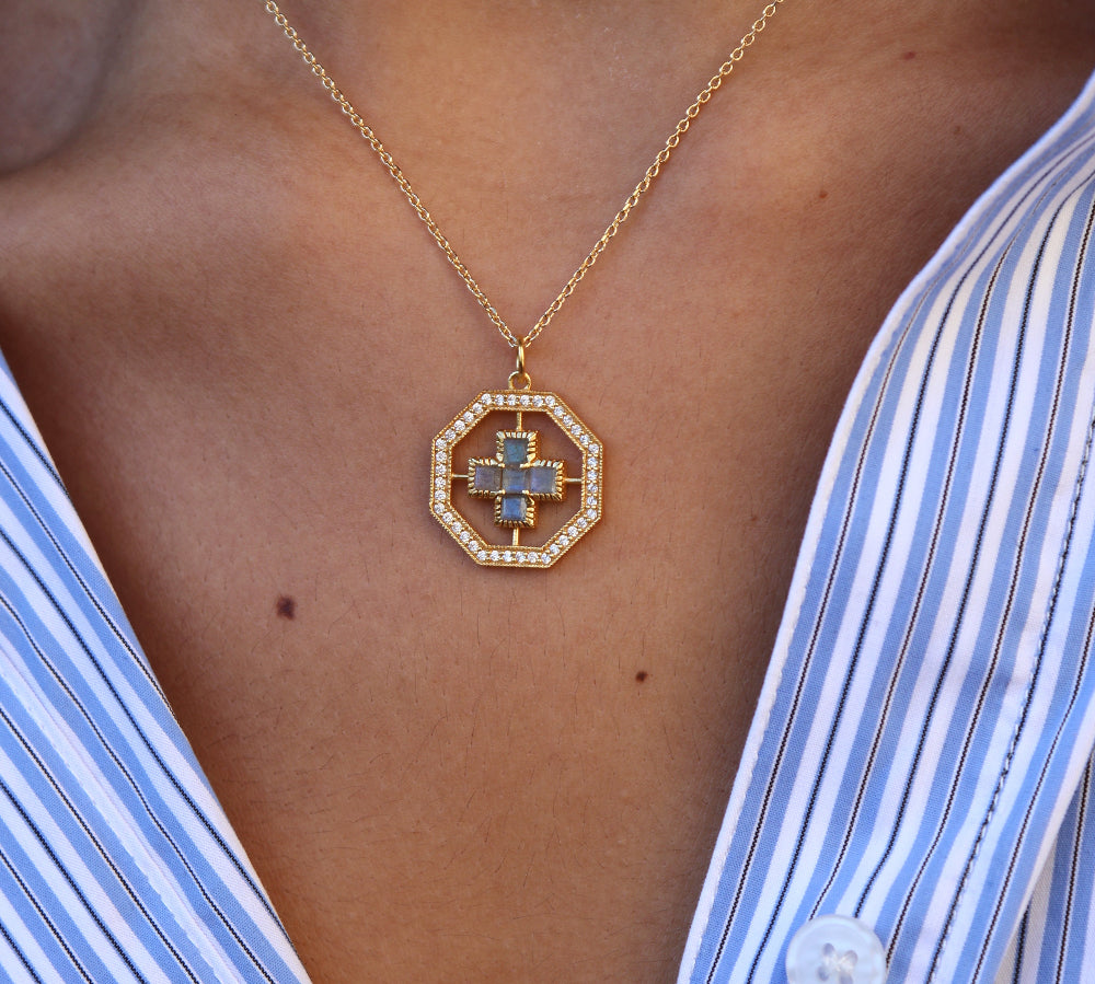 Gold necklace with square cross, stones and zircons