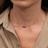 Gold choker with small natural stones