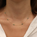 Gold necklace and natural stones
