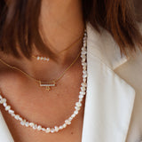 Gold necklace with zircon bar pendant