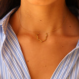 Lotus flower and zircon necklace