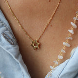 Gold necklace and hammered Star of David