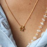 Gold necklace and hammered Star of David
