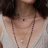 Gold necklace pendant duo of stones