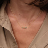 Golden necklace with natural stones and golden pearls