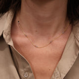 Gold necklace and natural stones