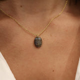 Golden necklace with natural stone Buddha pendant