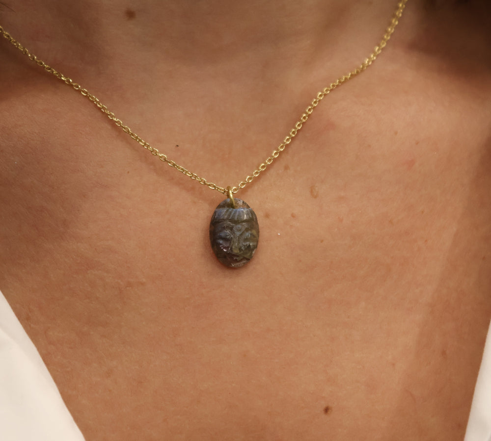 Golden necklace with natural stone Buddha pendant
