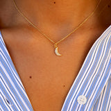 Golden moon and zircon necklace