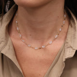 Gold necklace with round natural stones