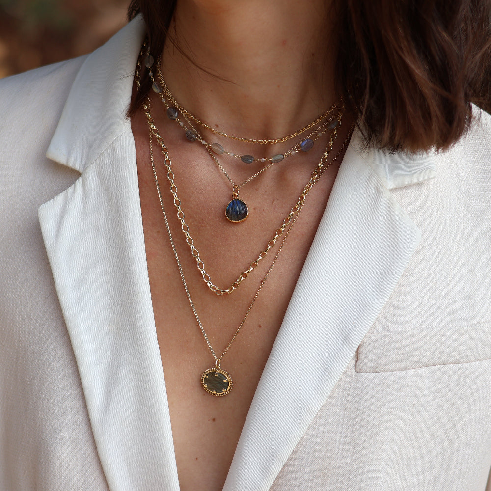 Gold necklace with stone shell pendant