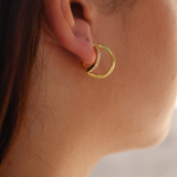 Double ring gold earrings with zircons