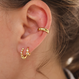 Gold and zircon ear jewel