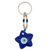 Porte-clefs étoile oeil en pâte de verre soufflé bleu