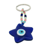 Porte-clefs étoile oeil en pâte de verre soufflé bleu