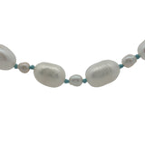 Collier doré alternance petites et grandes perles de culture avec noeuds turquoise 42 cm