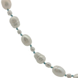Collier doré alternance petites et grandes perles de culture avec noeuds turquoise 42 cm