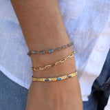 Gold bracelet and square natural stones