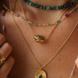 Golden necklace and multi-stone talisman