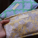 Green and white pouch