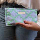 Green and white pouch