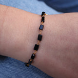 Gold bracelet and square natural stones