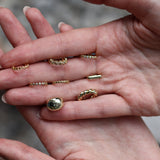 Mini gold hoop earrings with round zircons