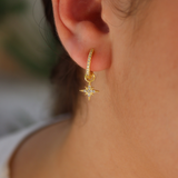 Mini gold hoop earrings with zircons and compass rose