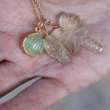 Gold necklace and natural stone palm tree