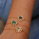 Flower bracelets with stones and white zircons