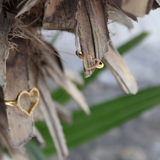 Small hollow heart and zircons gold ring