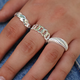 Silver ring with intertwined links