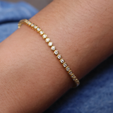 Gold tennis bracelet with 2mm zircons